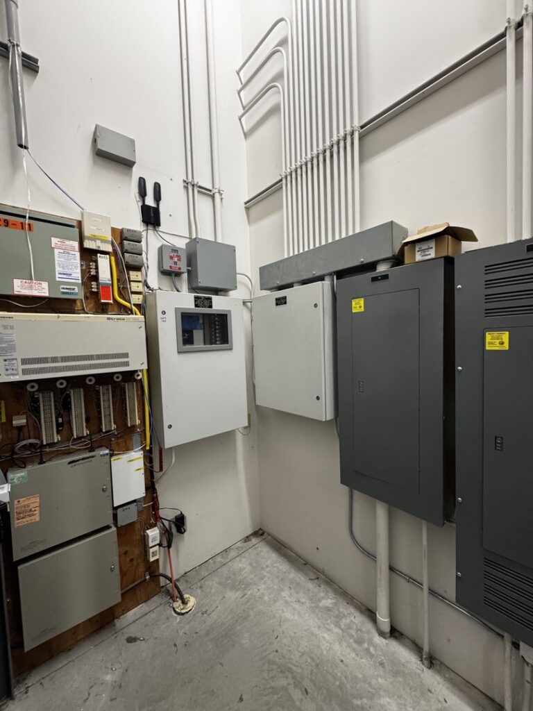 An electrical control room with multiple panels and conduits installed by kt_electricalcontractors in Spokane Valley, WA