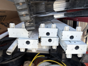 New electrical light fixtures and wiring components for installation by Midway Electric in Columbia, MO