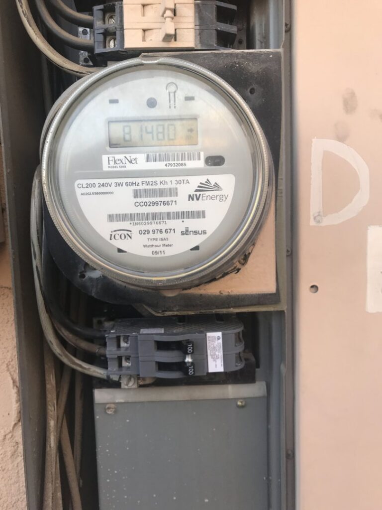 A close-up of an NV Energy electrical meter and wiring components by Neptune Electric LLC in Las Vegas, NV