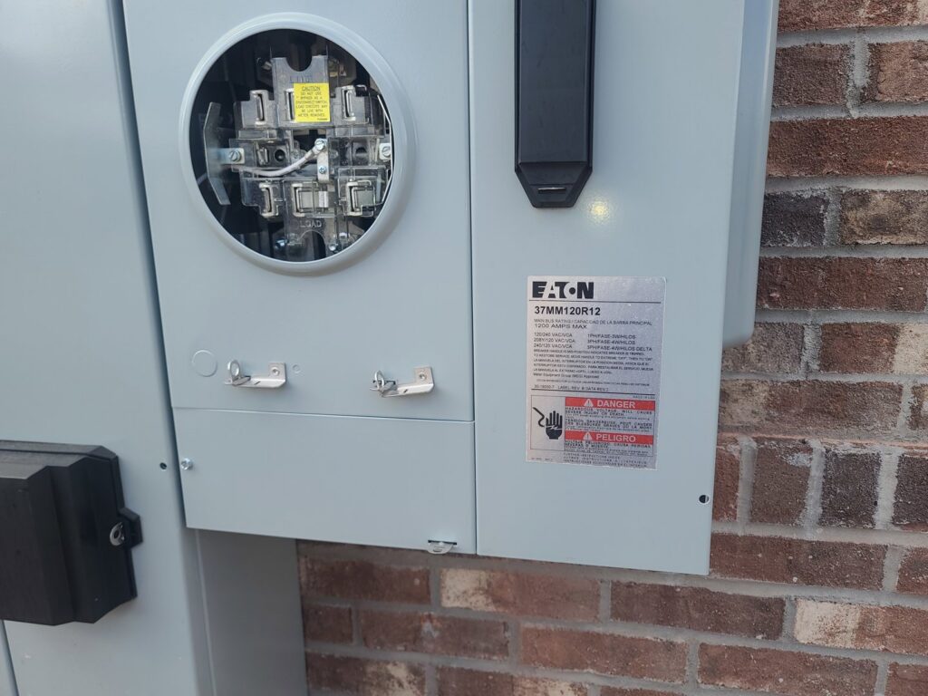 An outdoor electrical meter base and main disconnect panel installation by TOTAL Electric LLC in Fayetteville, NC.