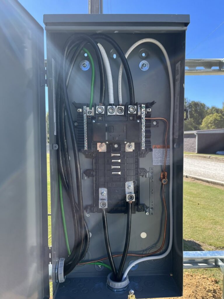 Close-up of electrical meter base wiring and connections by Spencer Electric in Hopkins, MN.