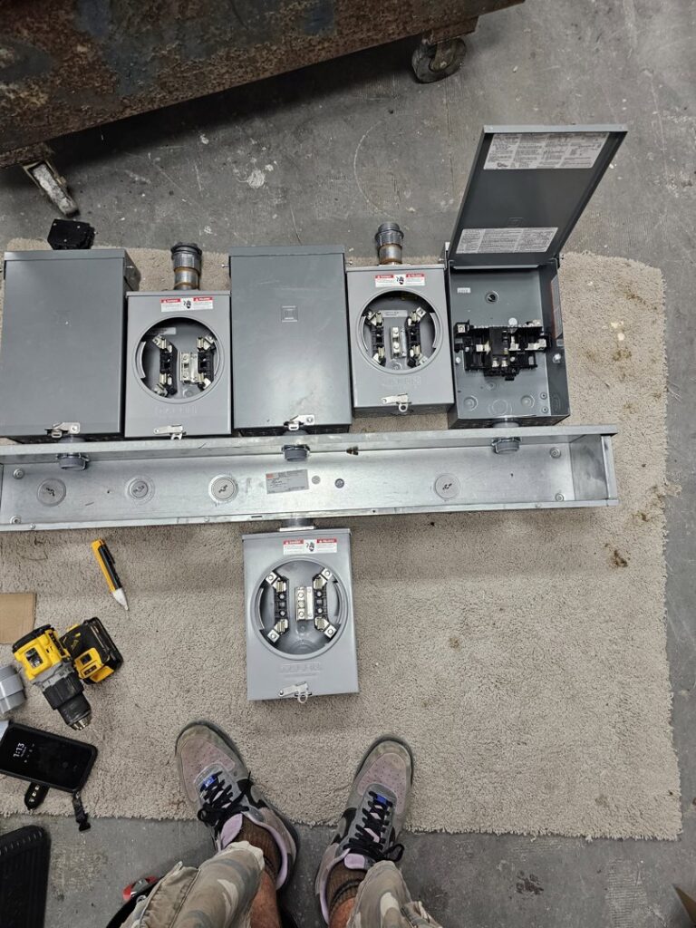 New electrical meter bases and conduit laid out for installation by Tim Lambert Electric in Fayetteville, NC.