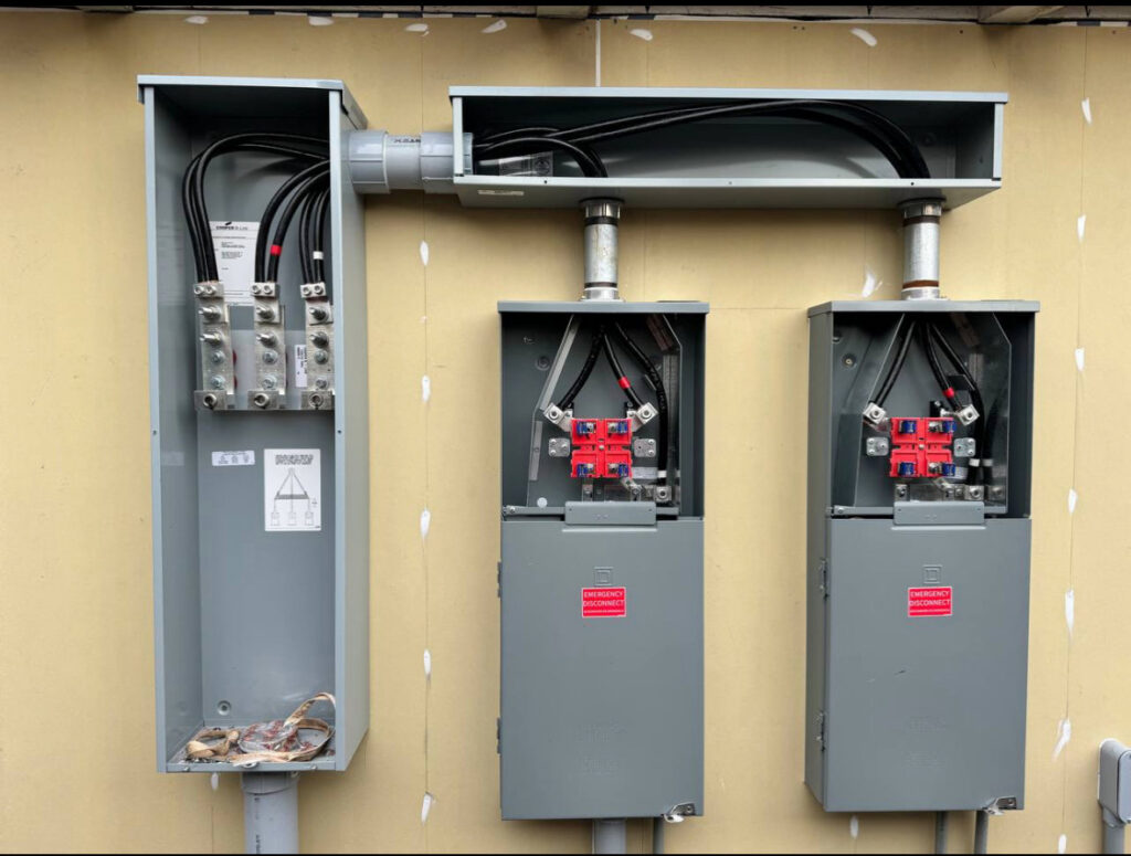 New electrical meter bases and conduit installed on a building by Vitality Electric in Sacramento, CA.
