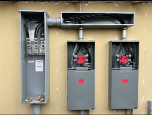 New electrical meter bases and conduit installed on a building by Vitality Electric in Sacramento, CA.