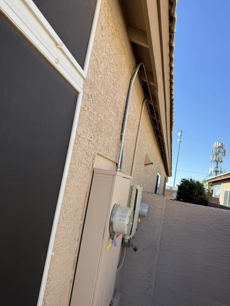 Electrical meter box and conduit installation on a residential property by Dependable Sparky Electric in Peoria, AZ