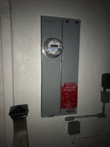 A newly installed electrical meter and service panel by Premo Electric in Spring Valley, CA