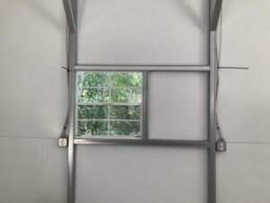 Electrical outlet installation on metal framing inside a building by Goodie's Electrical Contractors LLC in Dothan, AL