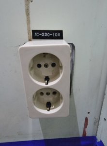 A close-up of a newly installed electrical outlet by Rain Man Thee Handyman in Hampton, VA.