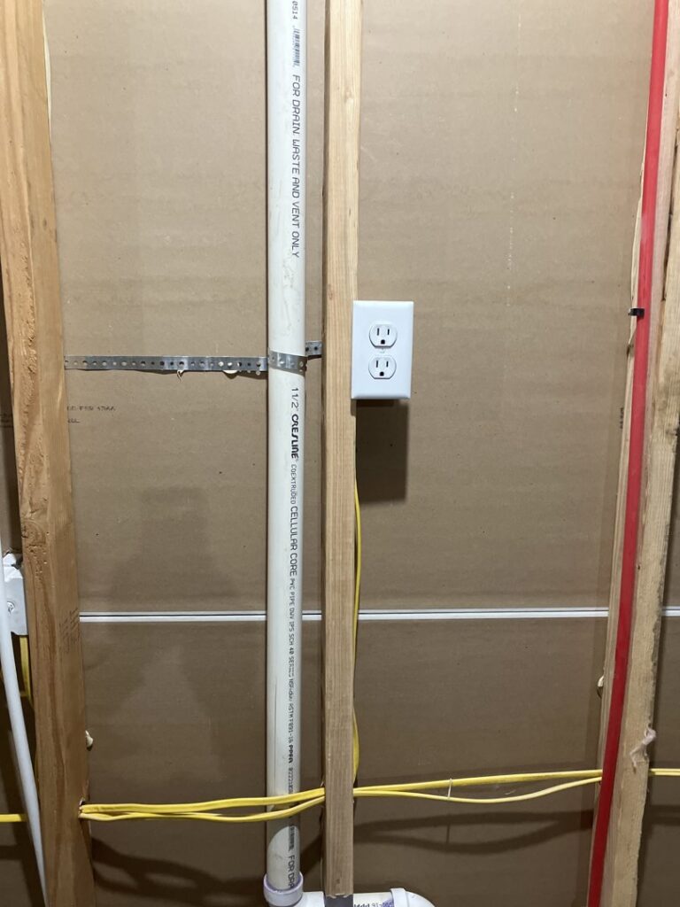 An electrical outlet and wiring during rough-in installation by Mister Sparky Kansas City, MO.