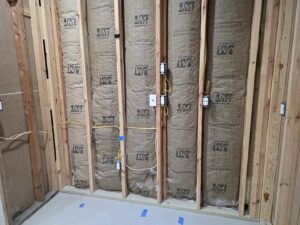 Electrical outlets and switches roughed into wall framing by Crawford Electric Services, LLC in Kings Mountain, NC.