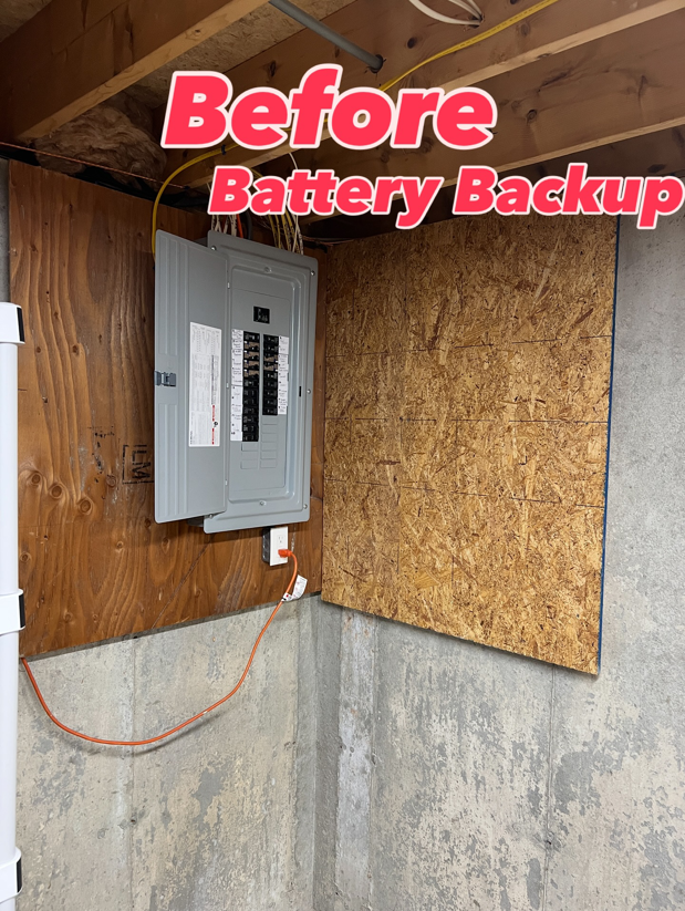 An existing electrical panel in a basement before a battery backup installation by IN Power Electric in Gorham, ME