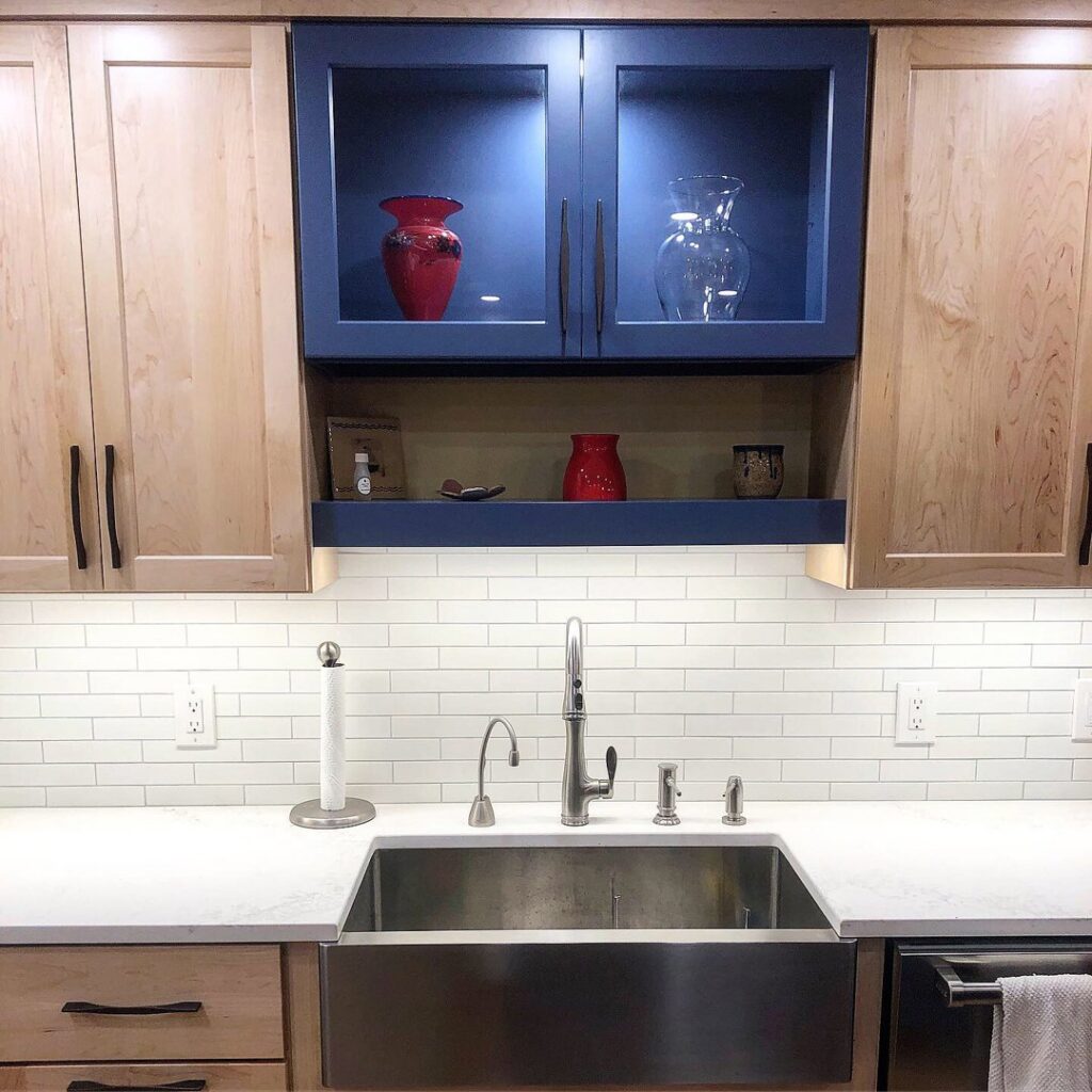 Multiple electrical panels and conduit installed on a concrete wall by Blay Electric in Concord, NH.