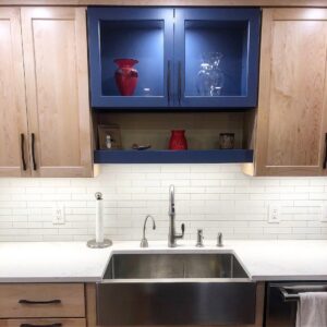 Multiple electrical panels and conduit installed on a concrete wall by Blay Electric in Concord, NH.