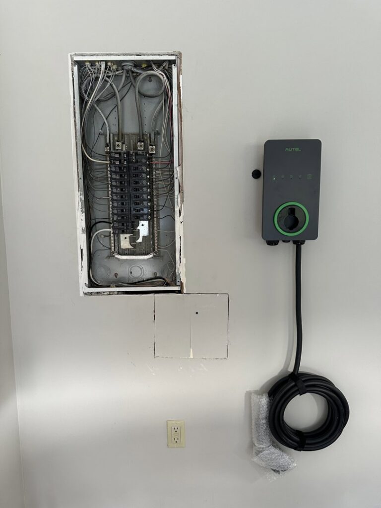 An electrical panel and EV charger installation by North Springs Electric Company in Sandy Springs, GA.