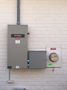 Electrical panels and meter base for a generator hookup by Albritton Electrical Service, Inc. in Tallahassee, FL.