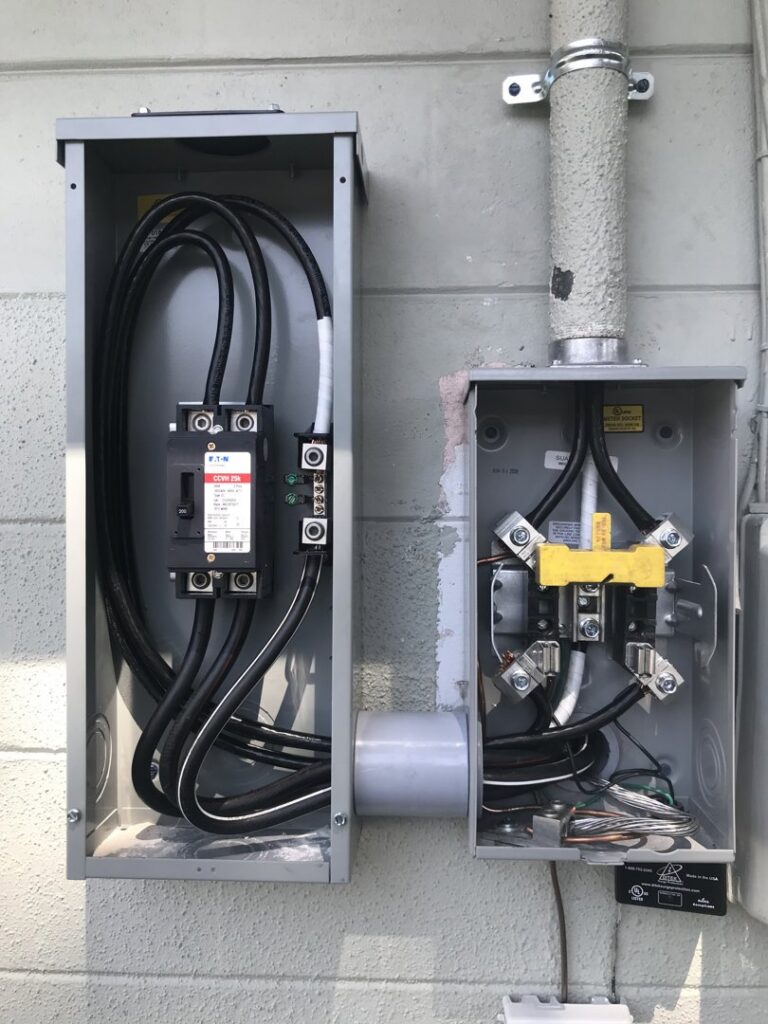 An exterior electrical panel and meter base installation by 60HZ Electric in St. Petersburg, FL.