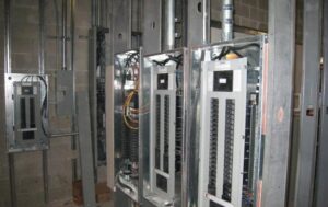 Multiple electrical panels being installed in a commercial building by Nech Electric Services Inc. in Chicago, IL.