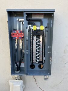An open electrical panel showing new wiring and circuit breakers installed by HomeRun Electric LLC in Arlington, TX