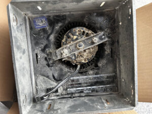 An electrical panel with wiring and an 'Approval for Electrical' sticker, indicating installation or inspection by Conductive Electrical Contracting in Smyrna, DE.