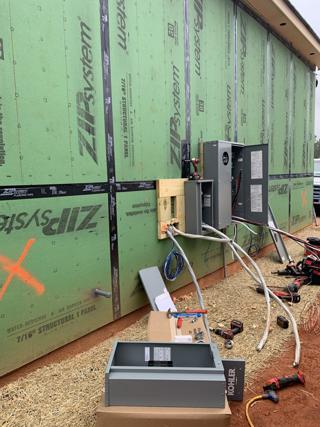 Electrical panel installation on a new construction building by Hilman Electric LLC in Greenville, SC.