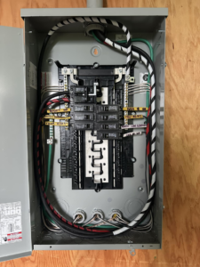 An electrical panel installation with organized wiring by Plugz Electric LLC in Forest Lake, MN
