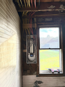 An electrical service panel (breaker box) installed in a wall during renovation by Power House Electrical LLC in Johnson City, TN
