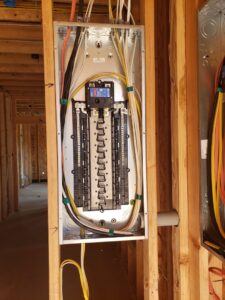 An electrical panel installation with wiring during new construction by Superior Electric and Lighting LLC in Southaven, MS