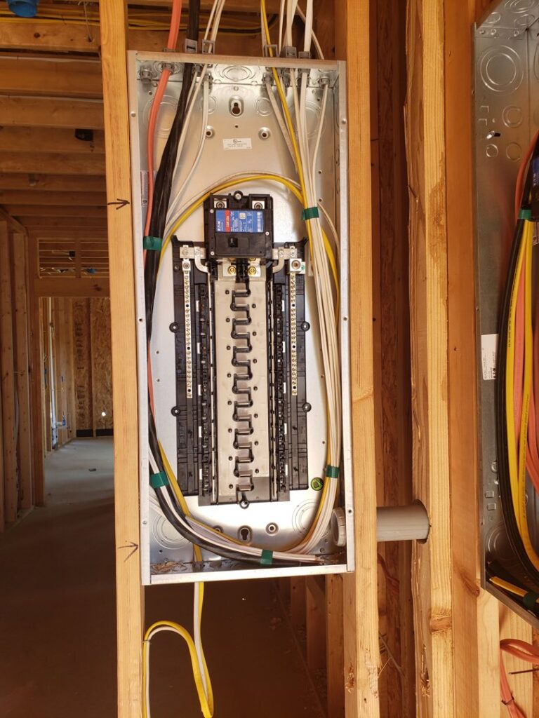 An electrical panel installation with wiring during new construction by Superior Electric and Lighting LLC in Southaven, MS