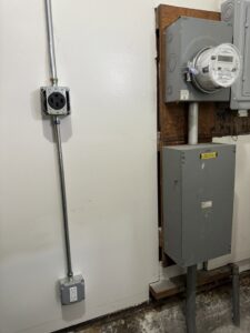 An electrical panel, meter, conduit, and outlets professionally installed by Thee electrician in San Francisco, CA