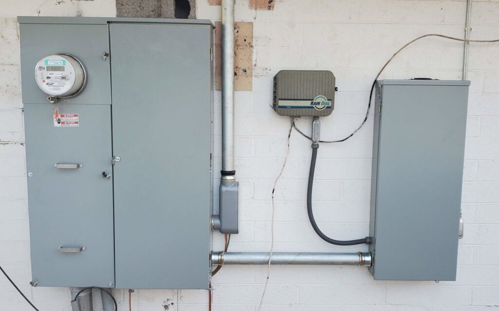Electrical panel and rough-in wiring during construction, showing work by Star Light Electric LLC in Phoenix, AZ