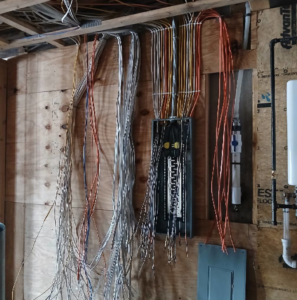 Essential Electric LLC performing electrical panel rough-in wiring for a new construction in Lancaster, KY.