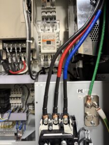 Close-up of electrical panel wiring and terminals by Pioneer Electric LLC in West Valley City, UT.