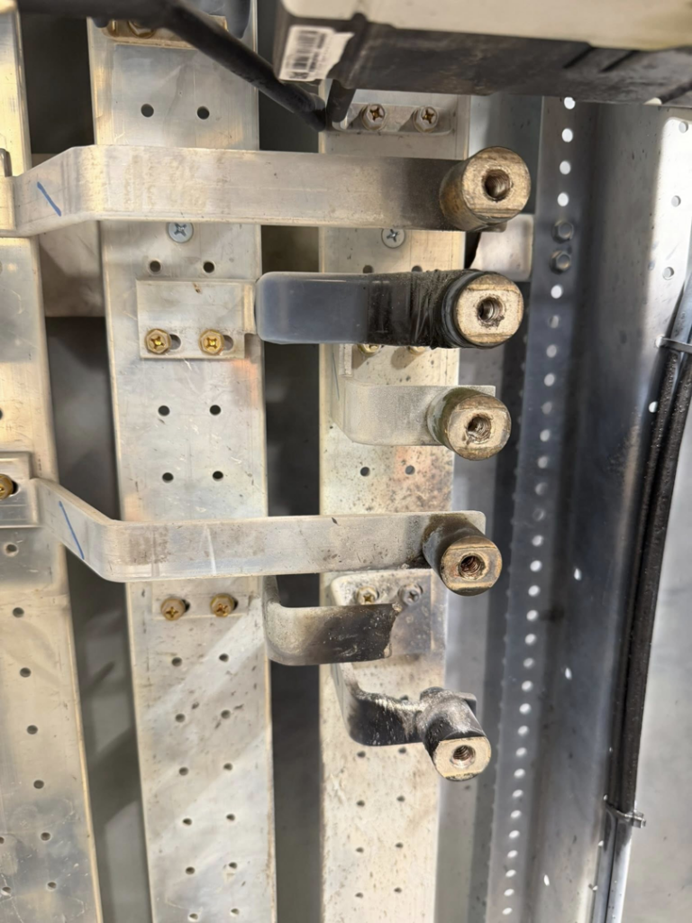 Detailed view of electrical panel wiring and components by Power Tech Electrical Services in Durham, NC.