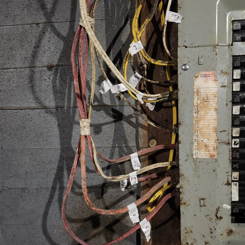 Detailed view of an electrical panel with labeled wiring, suggesting an inspection or service by SEL Electric in Truro, NS.