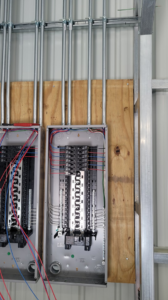 Close-up of electrical panel wiring and circuit breaker installation by A.C. Electrical in Sumter, SC.
