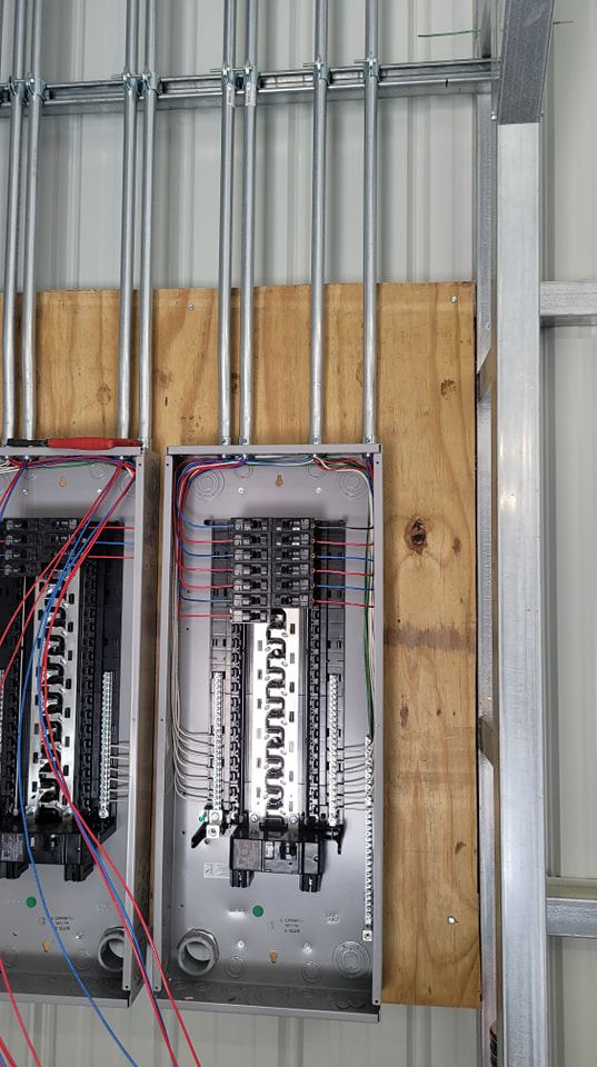 Close-up of electrical panel wiring and circuit breaker installation by A.C. Electrical in Sumter, SC.