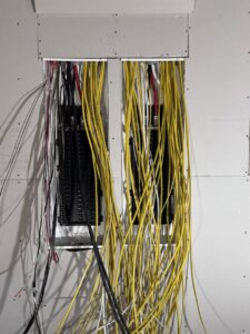 An electrical panel with numerous wires during an installation by Johnson Electric in Port Angeles, WA.