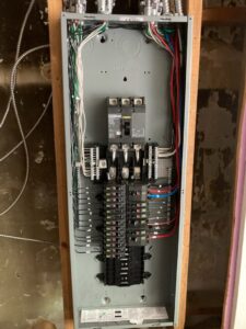 Detailed view of an electrical panel wiring installation by TOTAL Electric LLC in Fayetteville, NC.