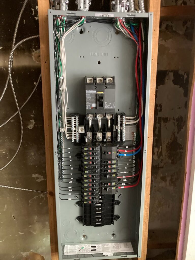 Detailed view of an electrical panel wiring installation by TOTAL Electric LLC in Fayetteville, NC.