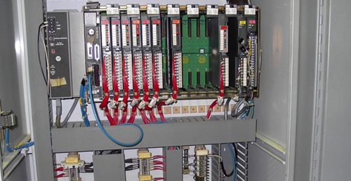 An intricate electrical panel with numerous wires and components, showcasing work by Your Gilbert Electrician in Gilbert, AZ.