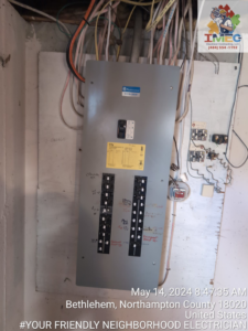 A closed electrical panel with circuit labels, indicating a completed service by Imecpower in Bethlehem, PA.