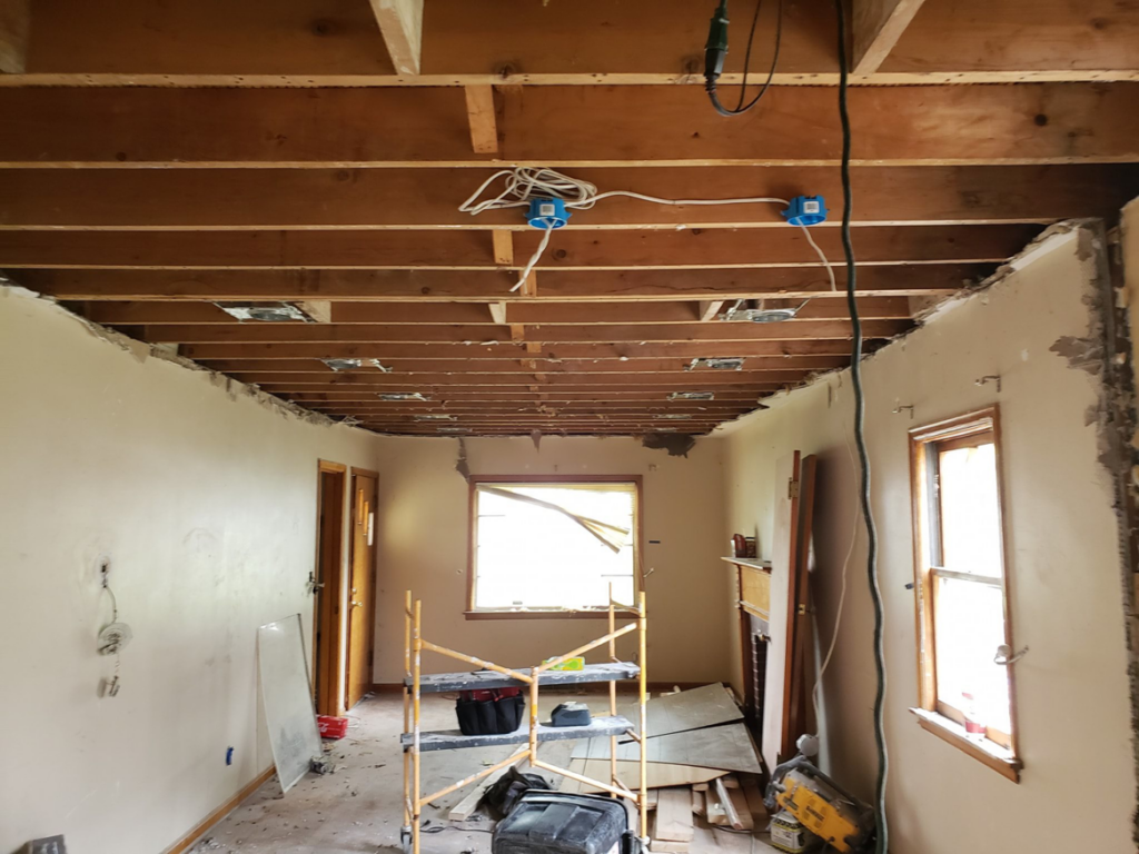 Exposed ceiling joists with new electrical wiring and junction boxes during a renovation by BMB ELECTRIC LLC in Columbus, OH.
