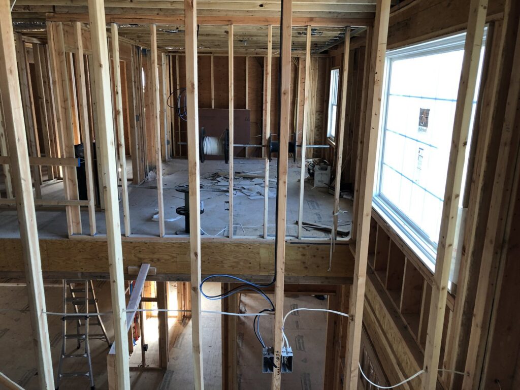 Electrical rough-in wiring and boxes visible in a new home under construction by Barrios Electric LLC in Norwalk, CT.