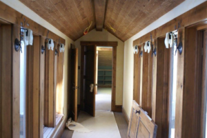 Electrical rough-in and wiring for wall sconces in a hallway by Accuracy Electric Incorporation in Lakewood, CO.