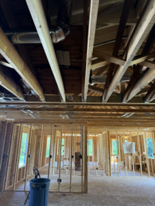 Electrical rough-in wiring installed in a new construction home by C.M.S Electrical in Staley, NC.