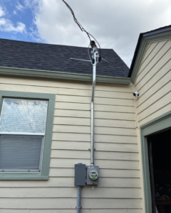 New electrical service entrance and meter box installation on a residential building by Zimmerman Electric Indy in Indianapolis, IN