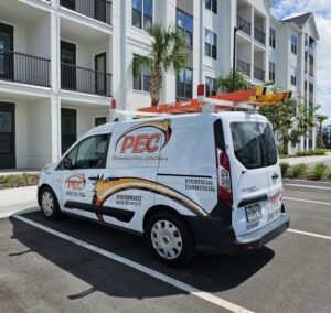Performance Electrical Contracting Inc. service van with ladders parked in Jacksonville, FL, ready for electrical jobs