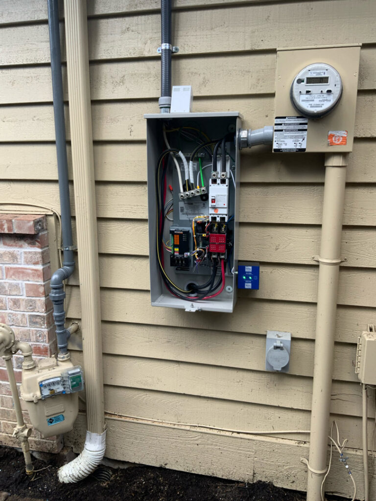 Detailed view of an electrical transfer switch wiring for a generator installation by Washington Generators LLC in Kent, WA.
