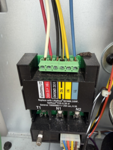 Close-up of electrical wiring connections and a terminal block by SGA Electric, LLC in Morehead City, NC.