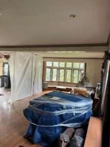 Exposed electrical wiring in a ceiling during a renovation project by Coffin Electric in Grimes, IA.